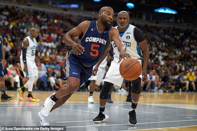 Former NBA star Baron Davis (5) of 3's Company handles the basketball during a game in 2018