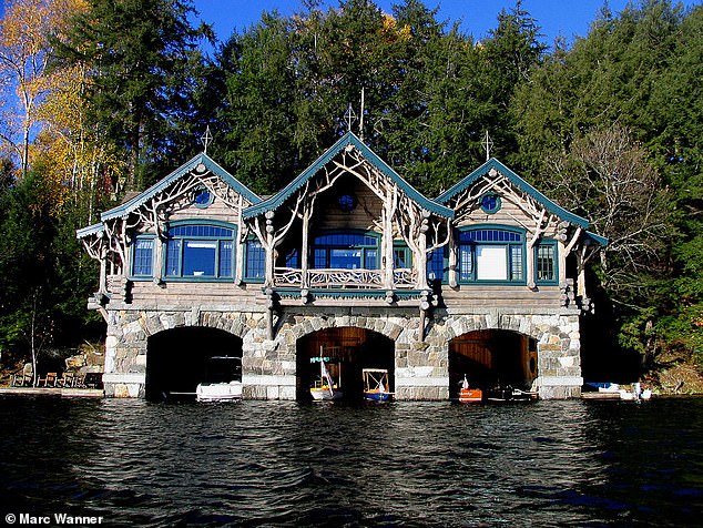 A picture of the boathouse at Camp Topridge, the private Adirondacks resort owned by billionaire Harlan Crow. Camp Topridge is invitation-only and has some unusual features including a recreation of Hagrid from Harry Potter's hut. Thomas disclosed staying there on his updated disclosure
