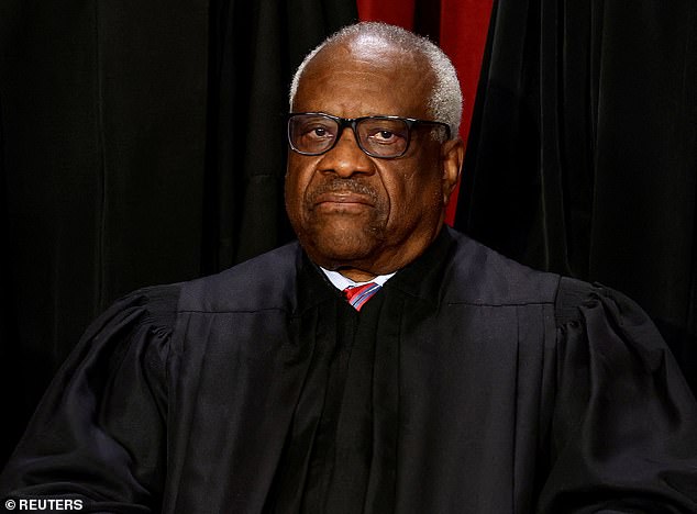 Justice Clarence Thomas, seen in his official portrait in 2022, complained to Republican Rep. Cliff Stearns during a commercial flight in January 2000 about how little Supreme Court justices were paid and pushed the lawmaker to look into it